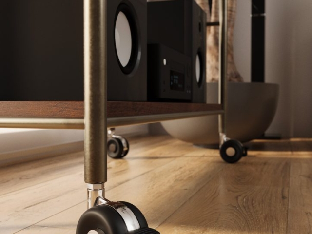 Rueda de diseño LAIA ZINC de Robby instalada en mueble de música.