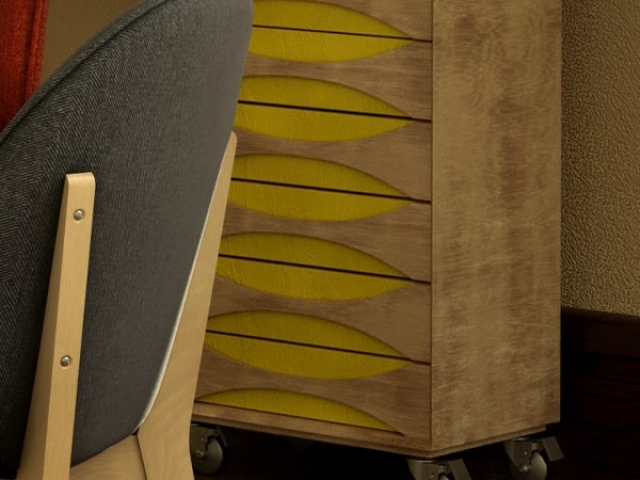 Rueda de diseño LISA de Robby instalada en mesa cajonera.