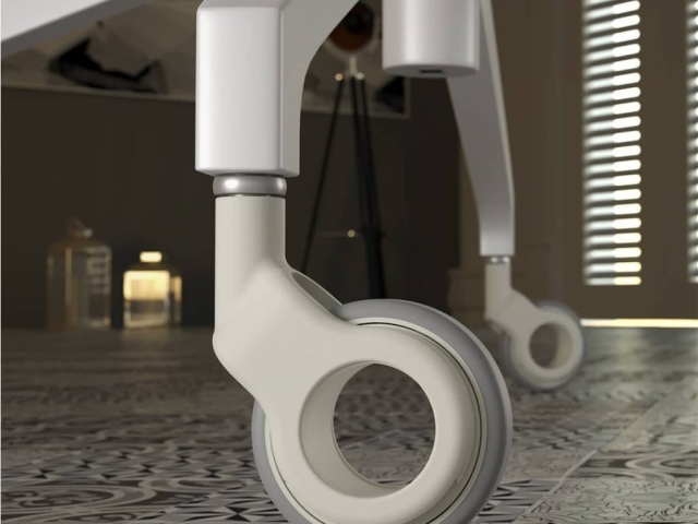 Ruedas instaladas en una silla blanca de diseño Robby OLYM NEO, combinando comodidad, estilo moderno y funcionalidad.