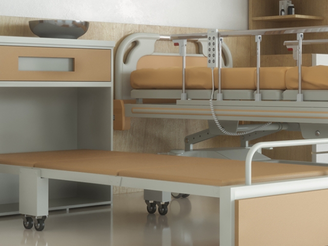 Rueda diseño Robby Emily, rueda fija instalada en cama de hospital.