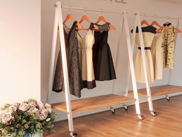 Rueda diseño Robby Emily, ruedas instaladas en mueble para tienda de ropa.