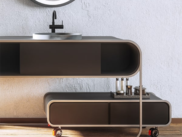 Rueda de diseño KOO EVO de Robby instalada en mueble de baño.